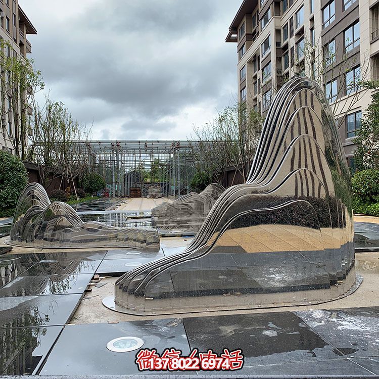 假山雕塑+不銹鋼噴泉，完美結(jié)合抽象鏡面美學(xué)