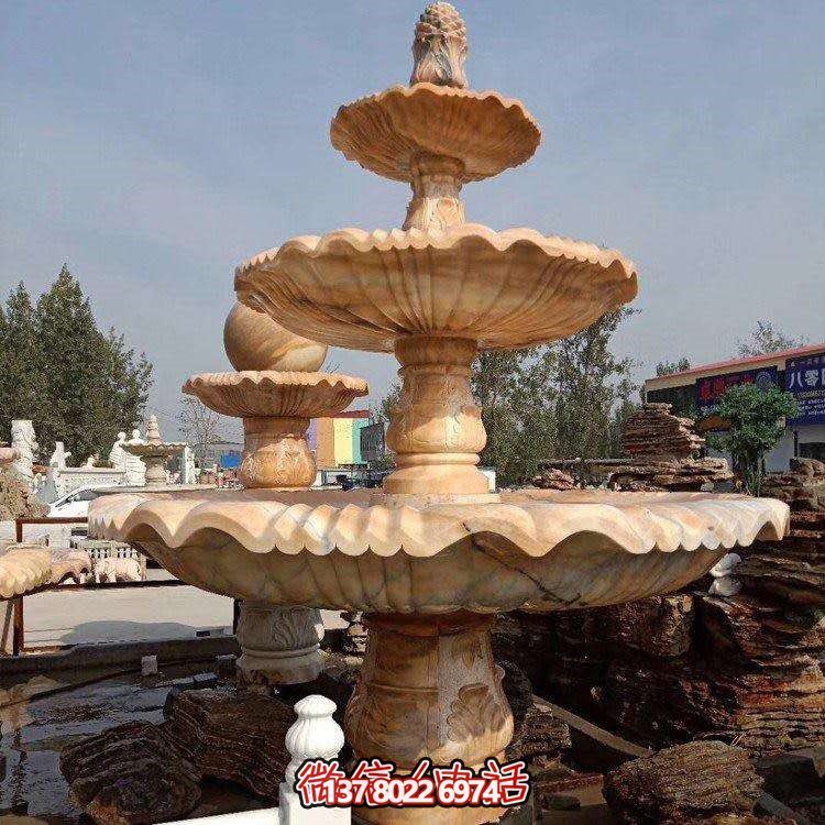紅石材雕刻層噴泉，點(diǎn)綴天然晚霞水園林